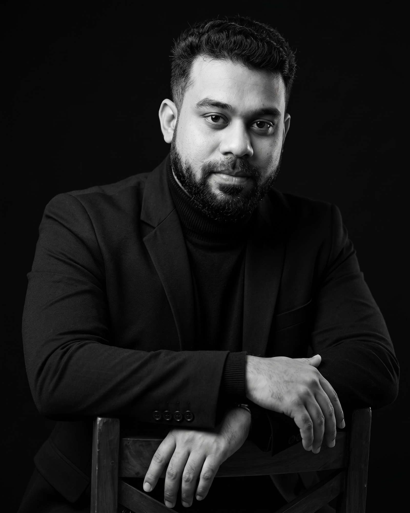 Monochrome portrait of RA. Prabhu seated