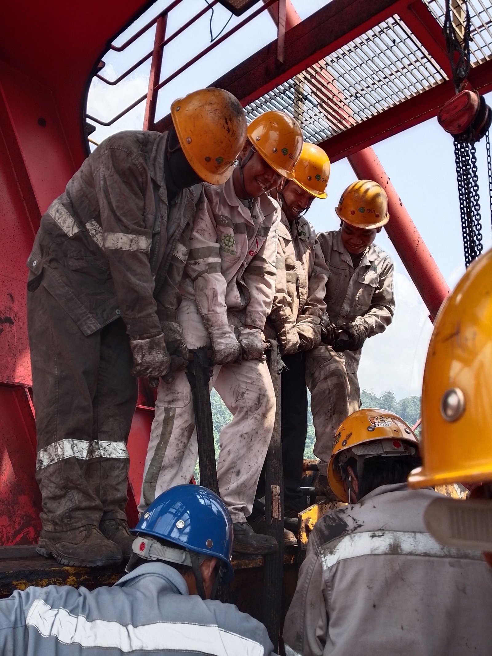 Industrial team working on equipment during a plant revamp